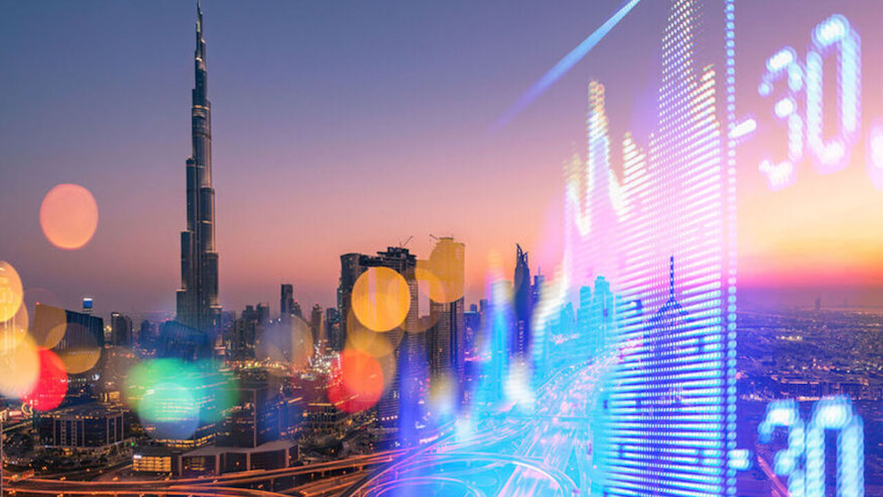 Dubai's Stock Market Exchange is pictured on a skyscraper.