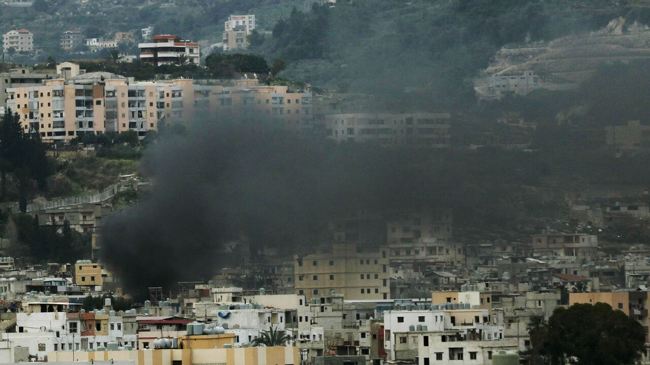 Smoke rises during clashes in Ain al-Hilweh camp, Lebanon's largest Palestinian refugee camp, near the southern coastal city of Sidon, Feb. 28, 2017.