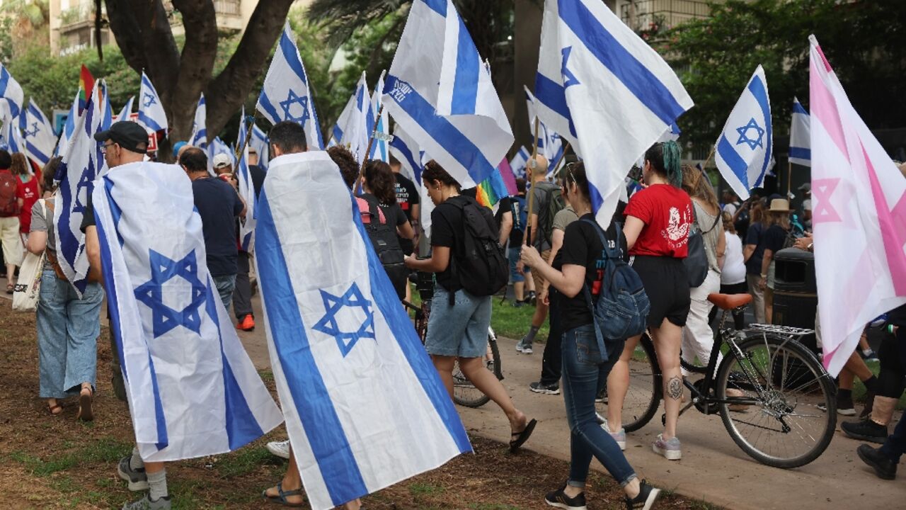 Demonstrators take to Tel Aviv's steets in a 'day of resistance' against the Israeli government's proposed judicial overhaul Demonstrators take to Tel Aviv's steets in a 'day of resistance' against the Israeli government's proposed judicial overhaul