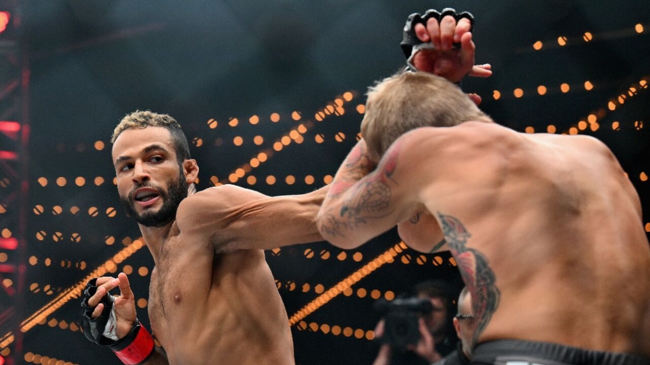 Saudi Arabia's Abdullah al-Qahtani (L) beat US fighter David Zelner (R) in a Professional Fighters League bout in New York last week
