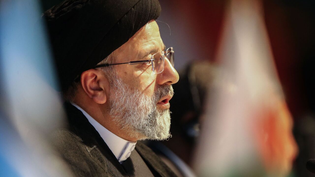 The President of Iran Ebrahim Raisi attends a meeting during the 2023 BRICS Summit at the Sandton Convention Centre in Johannesburg on Aug. 24, 2023.