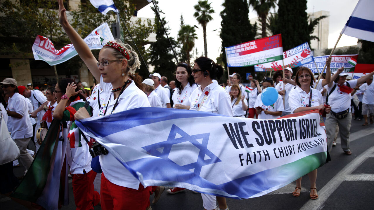 Evangelical Christian pilgrims from Hungary march during a parade in celebration of the Jewish holiday of Sukkot (Tabernacles) and to express solidarity with Israel, downtown Jerusalem, September 24, 2013.