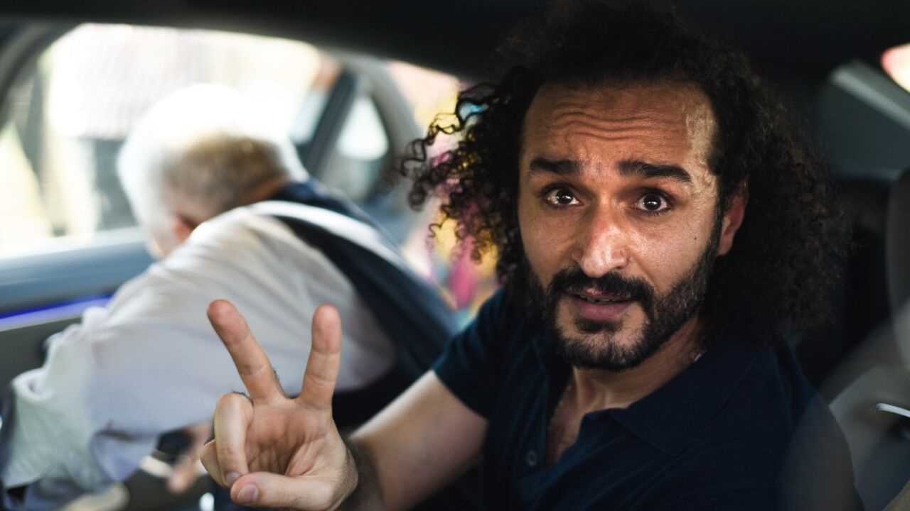 Egyptian activist Ahmed Douma, a leading figure in the country's 2011 uprising who has spent the past decade behind bars, gestures following his release from prison Egyptian activist Ahmed Douma, a leading figure in the country's 2011 uprising who has spent the past decade behind bars, gestures following his release from prison