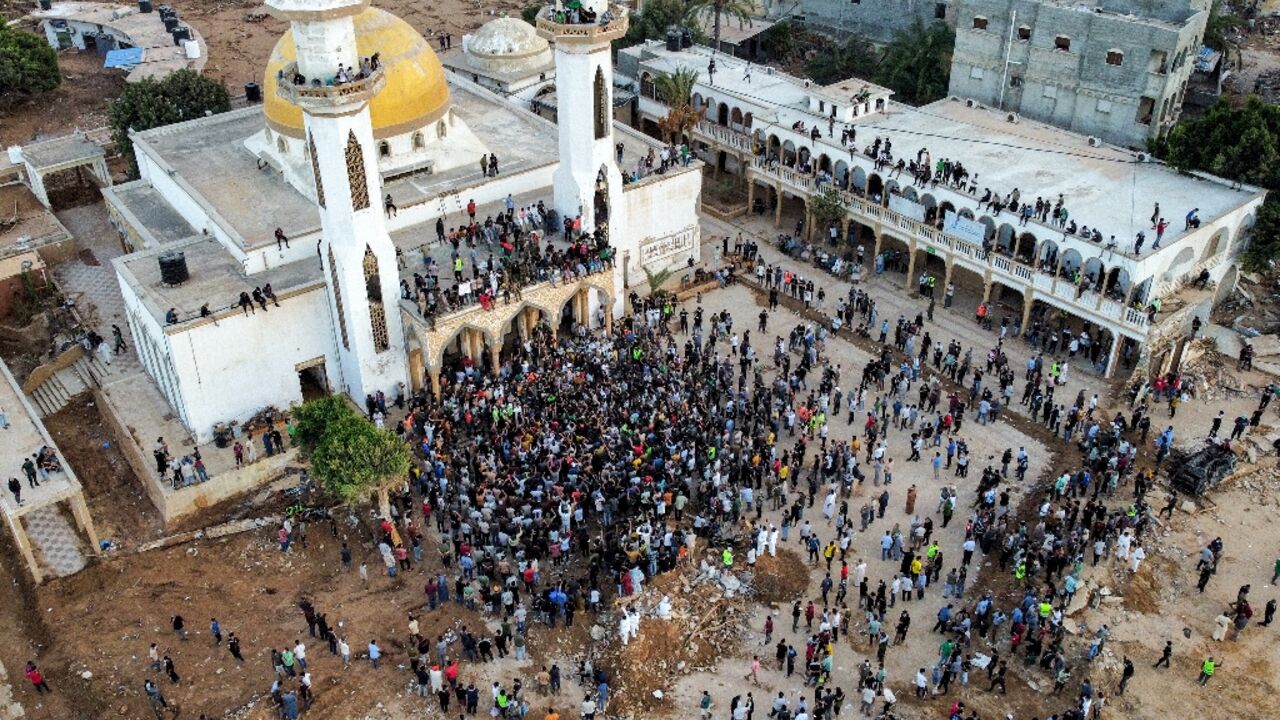 Protesters outside the Al-Sahaba mosque in Derna Protesters outside the Al-Sahaba mosque in Derna