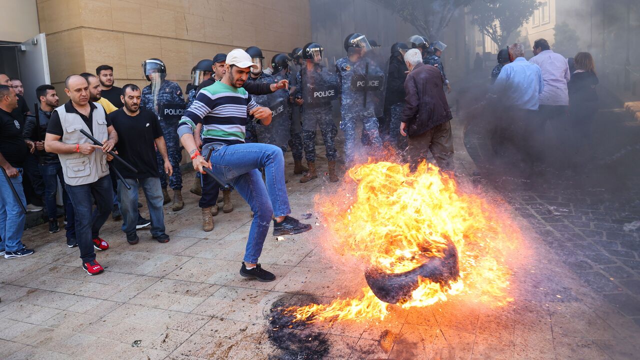  Lebanese protesters burn tyres during a demonstration called for by the banks depositors committee against monetary policies, on May 9, 2023. Lebanon's economic meltdown, described by the World Bank as one of the worst in recent global history, has plunged most of the population into poverty according to the United Nations. (Photo by ANWAR AMRO / AFP) (Photo by ANWAR AMRO/AFP via Getty Images)