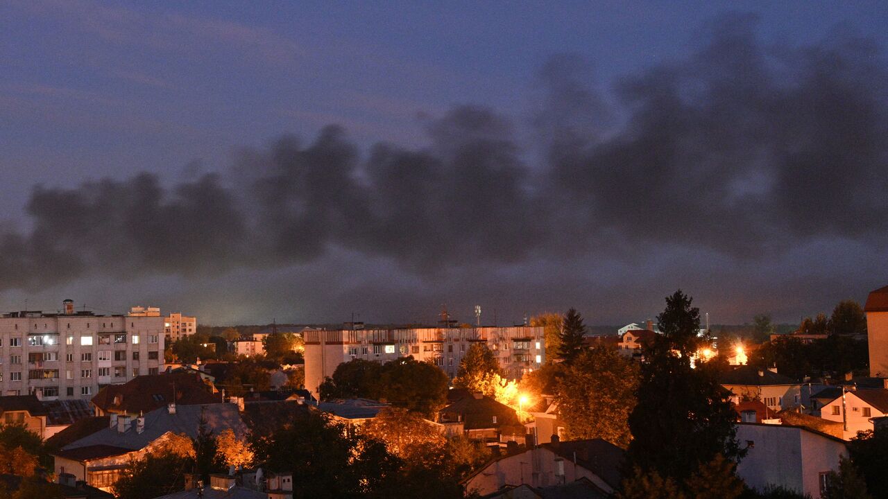 Black smoke billows over the city after drone strikes in the western Ukrainian city of Lviv on September 19, 2023, amid Russia's military invasion on Ukraine. Drones attacked Ukraine's western city of Lviv early on September 19, and explosions rang out, causing a warehouse fire and wounding at least one person. Several waves of drones buzzed overhead, starting around 0130 GMT, and an AFP journalist heard numerous explosions and movements of heavy vehicles through the streets during the nightly curfew. (Phot