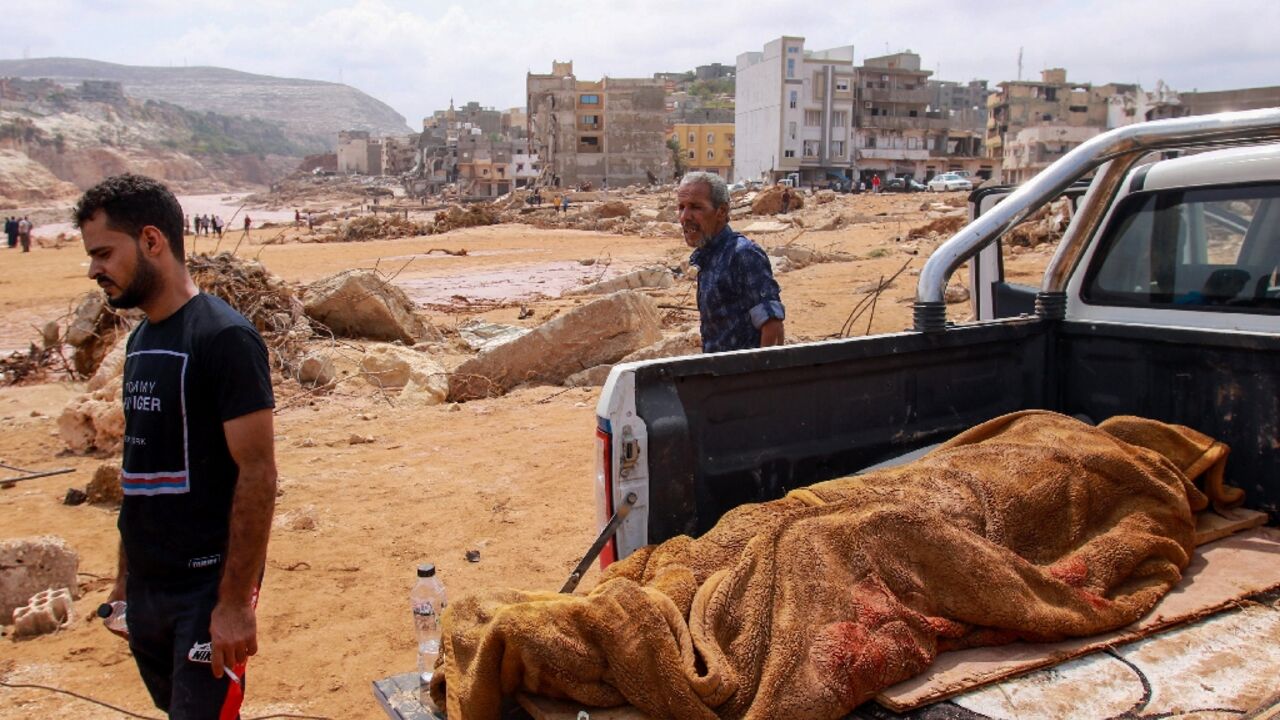 The preliminary death toll from authorities in the politically fractured North African country was at least 2,300 late Tuesday The preliminary death toll from authorities in the politically fractured North African country was at least 2,300 late Tuesday