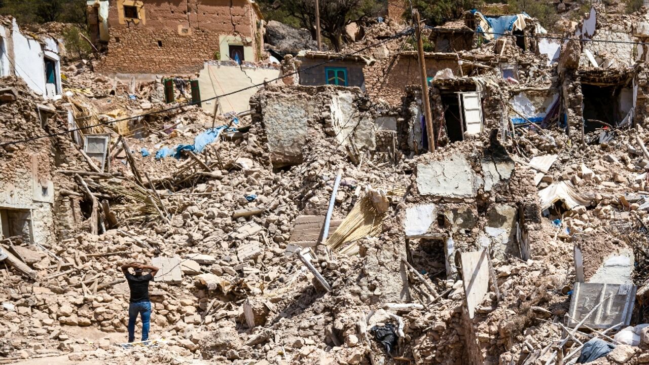 A villager looks at destroyed houses in Douzrou on September 12, 2023, following the 6.8-magnitude earthquake