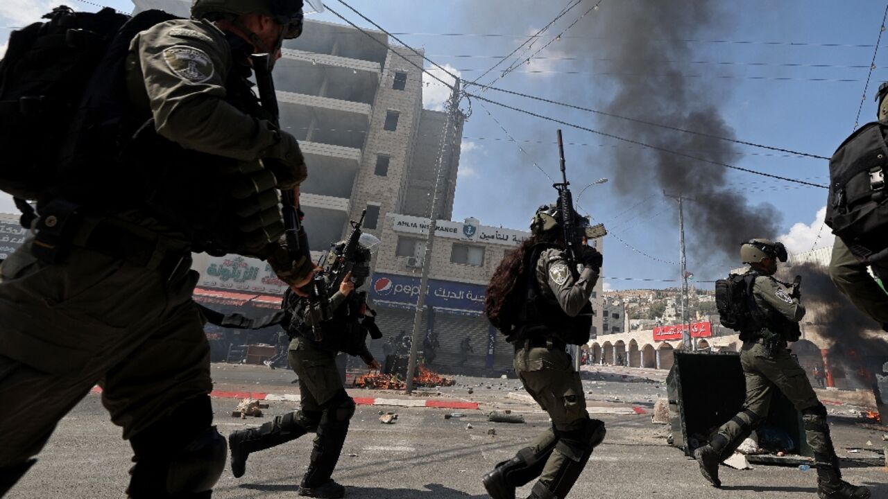 Israeli soldiers deploy during the funeral of Labib Damidi