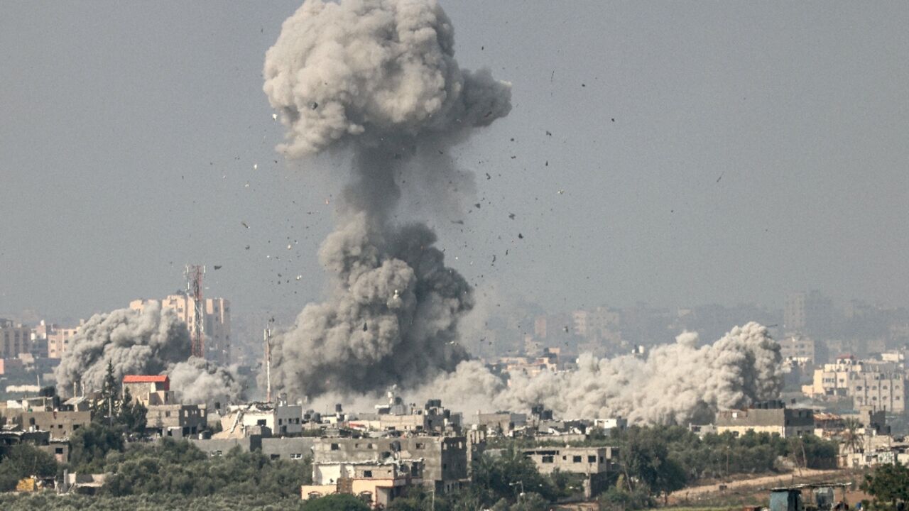 Smoke billows above the northern Gaza Strip following an Israeli strike, in an image taken from the southern Israeli city of Sderot on October 23, 2023