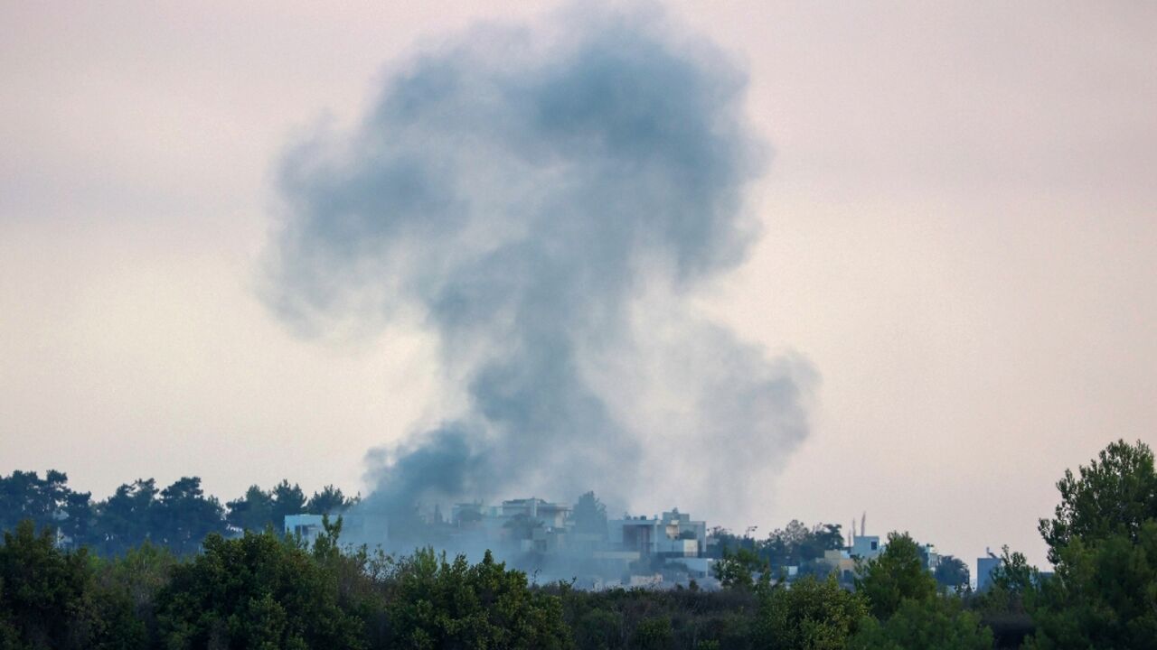 Smoke billows after an Israeli strike on the Lebanese village of Alma Ach-Chaab Smoke billows after an Israeli strike on the Lebanese village of Alma Ach-Chaab