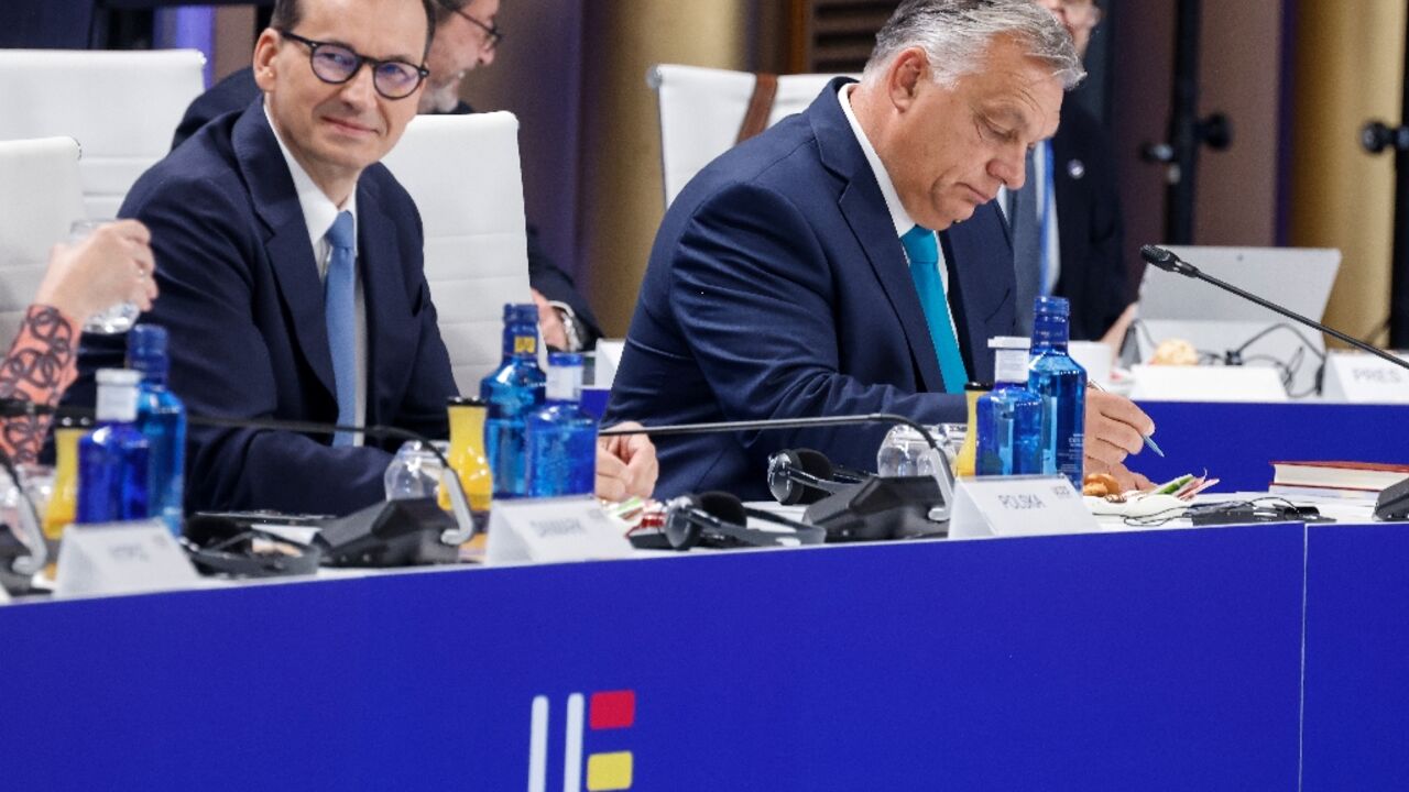 Poland's Mateusz Morawiecki and Hungary's Viktor Orban reject the EU's proposed migration reform plan Poland's Mateusz Morawiecki and Hungary's Viktor Orban reject the EU's proposed migration reform plan