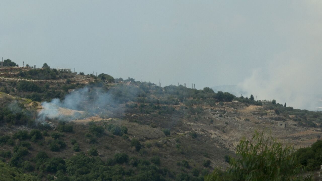 Smoke rises from a hillside in southern Lebanon as it is shelled by Israeli forces following cross-border missile fire by Hezbollah Smoke rises from a hillside in southern Lebanon as it is shelled by Israeli forces following cross-border missile fire by Hezbollah