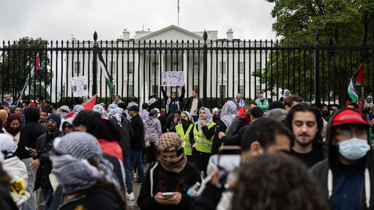 People demonstrate during a pro-Palestinian rally in front of the White House People demonstrate during a pro-Palestinian rally in front of the White House