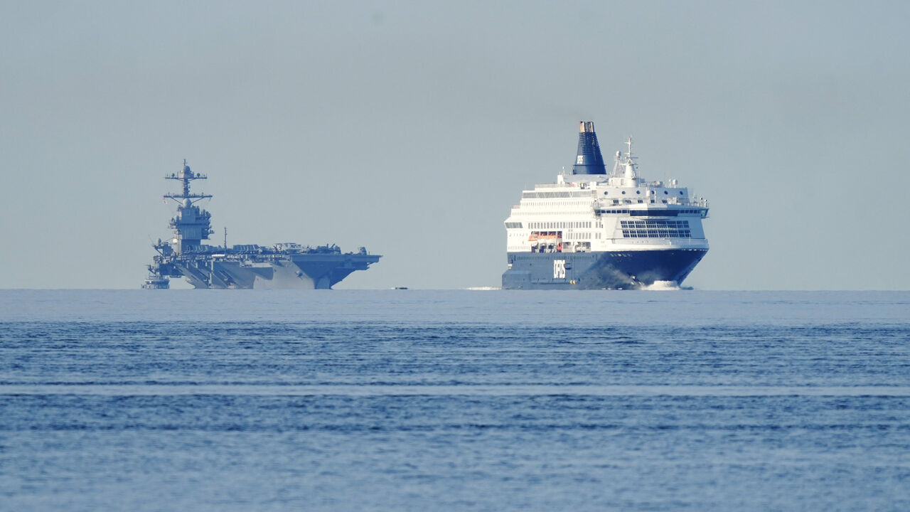 This photograph taken on May 24, 2023 shows the US aircraft carrier USS Gerald R. Ford cruising near Jeloya island, in Moss, south of Oslo. The ship is the world's largest warship and will be in port in Oslo for four days. Russia's embassy in Norway on Tuesday, May 23, 2023 hashly criticised the visit by the US aircraft carrier to Oslo as an "illogical and harmful" show of force. (Photo by Terje Pedersen / NTB / AFP) / Norway OUT (Photo by TERJE PEDERSEN/NTB/AFP via Getty Images)