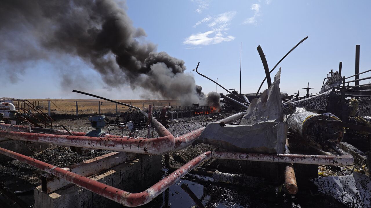  Smoke billows from the Babasi oil facility in the countryside of al-Qahtaniya in Syria's Kurdish-controlled northeastern Hasakeh province on October 6, 2023 following a Turkish strike. (Photo by Delil souleiman / AFP) / "The erroneous mention[s] appearing in the metadata of this photo by Delil souleiman has been modified in AFP systems in the following manner: [BABASI] instead of [BASBASI]. Please immediately remove the erroneous mention[s] from all your online services and delete it (them) from your serve