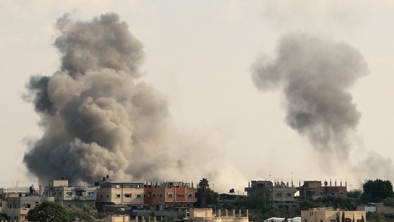 Smoke billows over Gaza's Rafah border crossing with Egypt its only one that bypasses Israel following an Israeli air strike