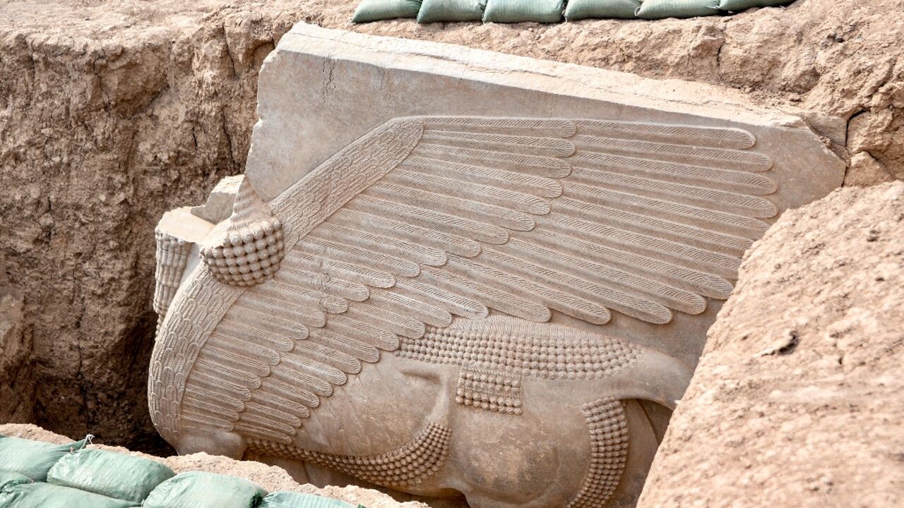 This 2,700 year old relief uncovered by archaeologists in northern Iraq depicts a lamassu, an Assyrian deity portrayed with a human head, the body of a bull and the wings of a bird This 2,700 year old relief uncovered by archaeologists in northern Iraq depicts a lamassu, an Assyrian deity portrayed with a human head, the body of a bull and the wings of a bird