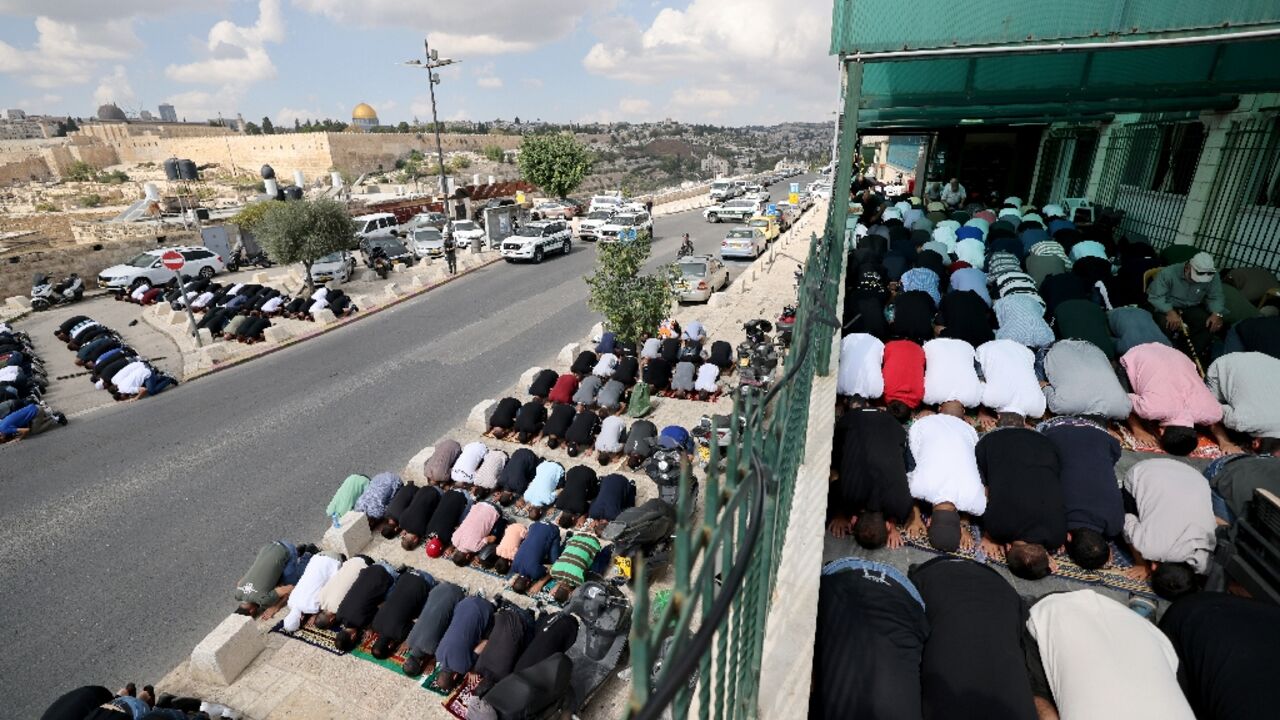 With many Muslims unable to reach Jerusalem's Al-Aqsa mosque to pray, they could be seen praying on the streets outside the Old City With many Muslims unable to reach Jerusalem's Al-Aqsa mosque to pray, they could be seen praying on the streets outside the Old City