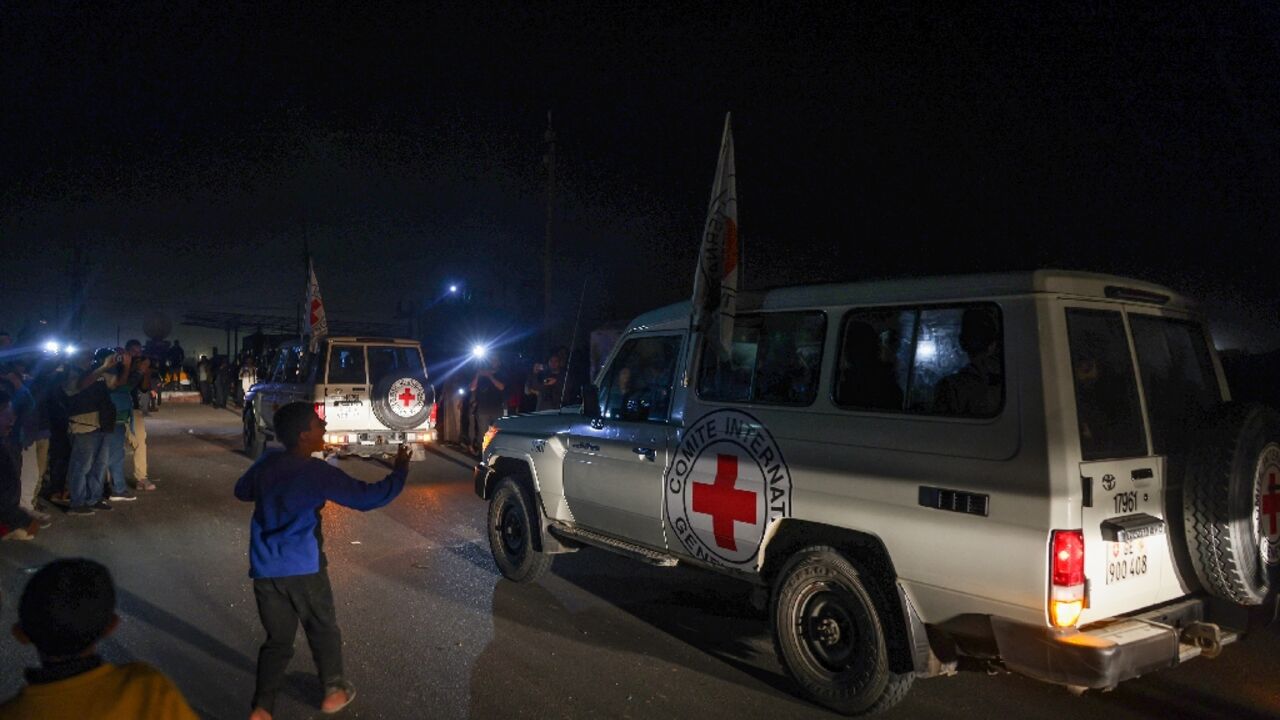 Red Cross jeeps reportedly carrying Israeli hostages cross the Rafah border point between Gaza and Egypt Red Cross jeeps reportedly carrying Israeli hostages cross the Rafah border point between Gaza and Egypt