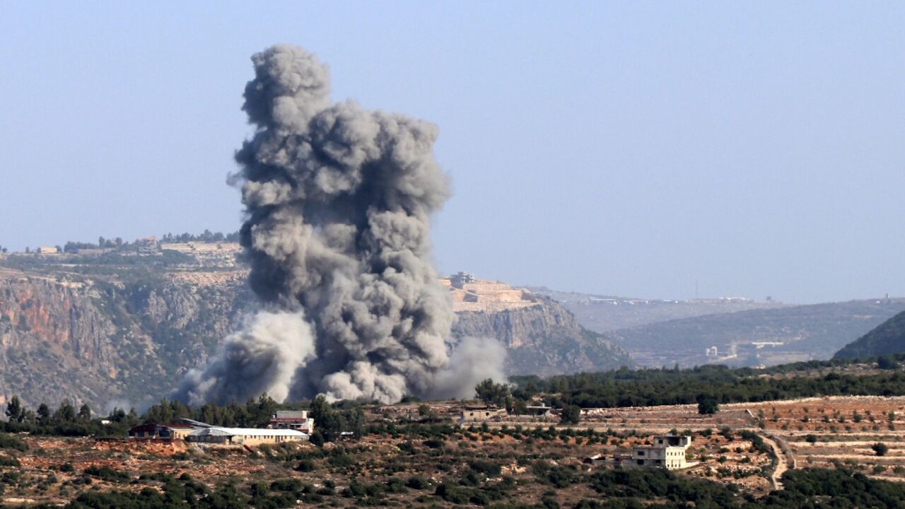 Smoke billows from the site of an Israeli strike in Lebanon's southern village of Jibbayn near the boder with northern Israel on November 23, 2023 Smoke billows from the site of an Israeli strike in Lebanon's southern village of Jibbayn near the boder with northern Israel on November 23, 2023