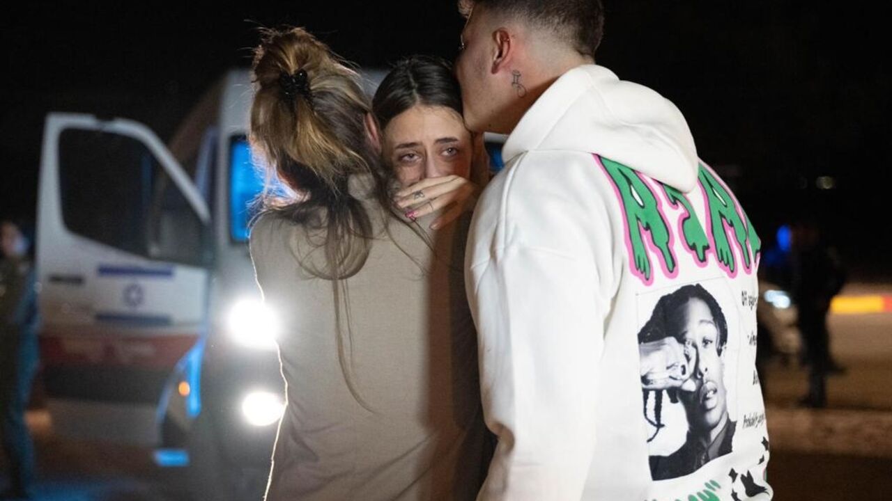 Former Franco-Israeli hostage Mia Shem greets her mother and brother following her release by Hamas Former Franco-Israeli hostage Mia Shem greets her mother and brother following her release by Hamas
