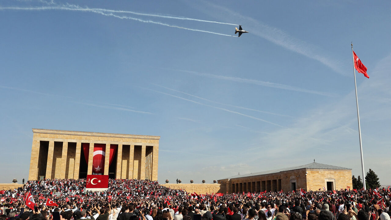 The Soloturk aerobatic demonstration team of the Turkish Air Force flies an F-16 aircraft over Anitkabir, the mausoleum of Turkish Republic's Founder Mustafa Kemal Ataturk, during celebrations to mark the 100th anniversary of the Republic of Turkey in Ankara, on October 29, 2023. Turkey marked its centenary as a post-Ottoman republic on October 29, 2023, with somewhat muted celebrations held in the shadow of Israel's escalating war with Hamas militants in Gaza. (Photo by Adem ALTAN / AFP) (Photo by ADEM ALT