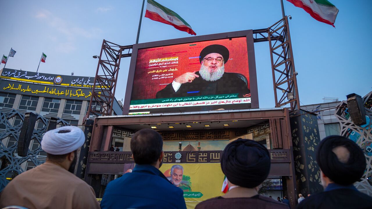 11/03/2023 Tehran, Iran. In a pro-government rally in the Islamic Republic of Iran, people gathered at Imam Hossein Square in Tehran on November 3, 2023, to watch Hezbollah Secretary General Hassan Nasrallah's speech regarding the Israel-Hamas conflict. Among the crowd, Lebanon's Hezbollah flags and Palestinian flags were proudly waved. During the speech in Beirut, Nasrallah addressed the Israeli army's attack on Gaza and issued a warning to Israel about a potential attack on Lebanon. (Photo by Hossein Beri