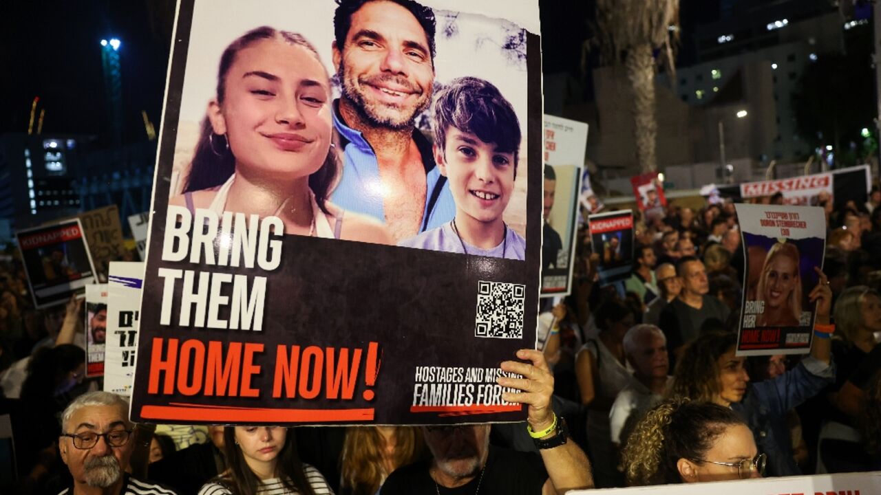 Protesters rally in Tel Aviv on November 18, 2023 to demand the release of Israelis held hostage in Gaza since the October 7 attack by Hamas militants Protesters rally in Tel Aviv on November 18, 2023 to demand the release of Israelis held hostage in Gaza since the October 7 attack by Hamas militants