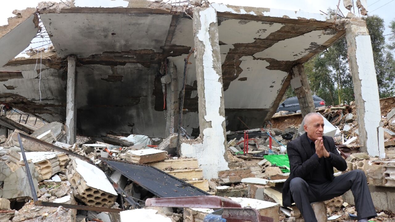 Mayor Talal Akil at his home in the village of Jibbain near the border with Israel on November 20, 2023, after it was hit the night before by an Israeli strike