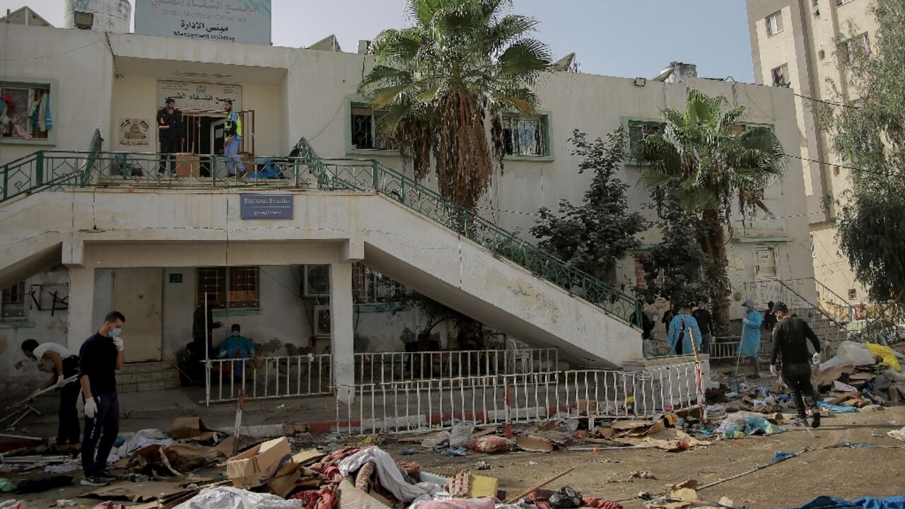 The scene of damage outside the Al-Shifa hospital on November 26 after Israeli forces withdrew The scene of damage outside the Al-Shifa hospital on November 26 after Israeli forces withdrew
