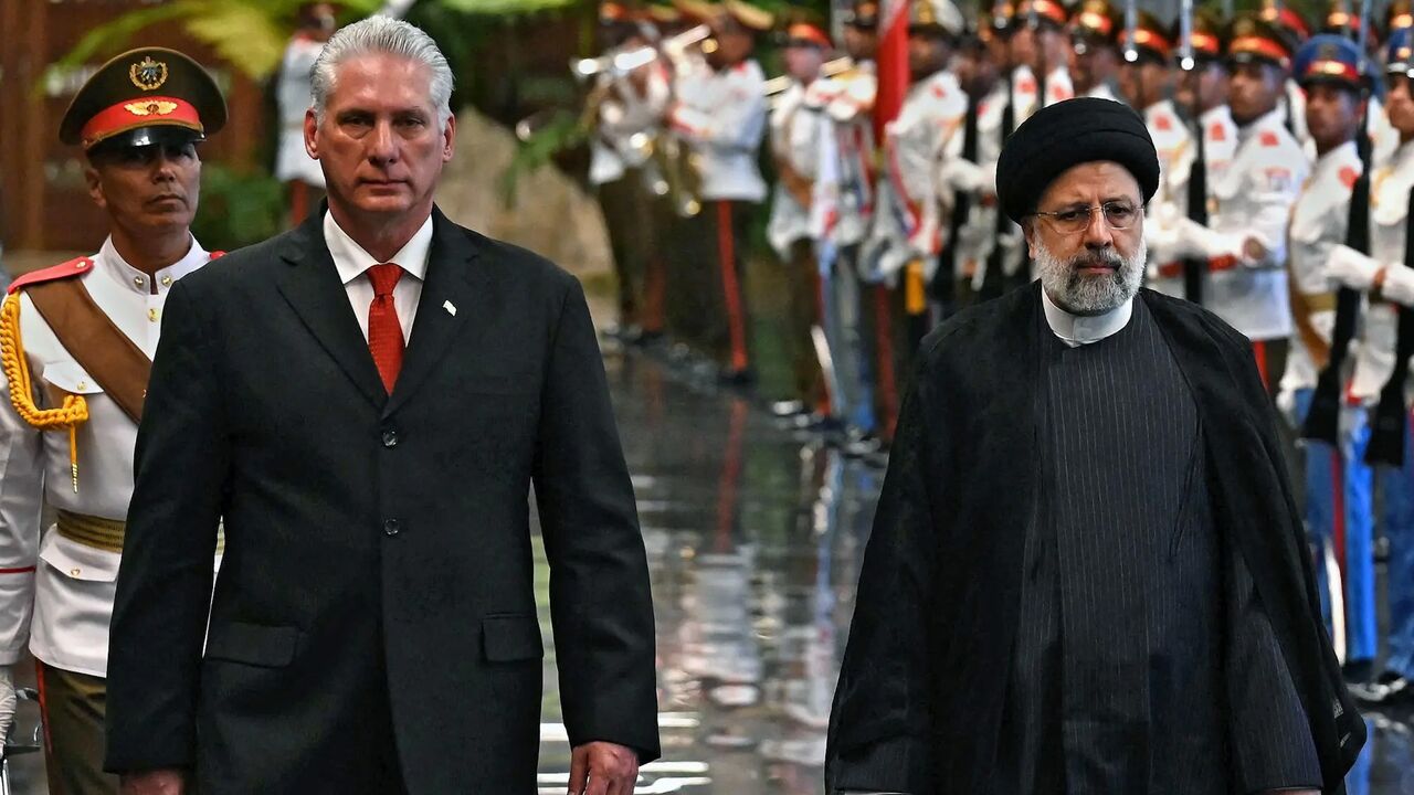 President Miguel Diaz-Canel of Cuba, left, and President Ebrahim Raisi of Iran reviewing the honor guard during a welcoming ceremony in Havana on June 15, 2023.