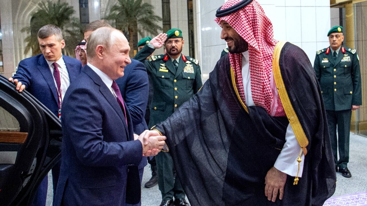 Russian President Vladimir Putin is greeted by Saudi Crown Prince Mohammed bin Salman in Riyadh