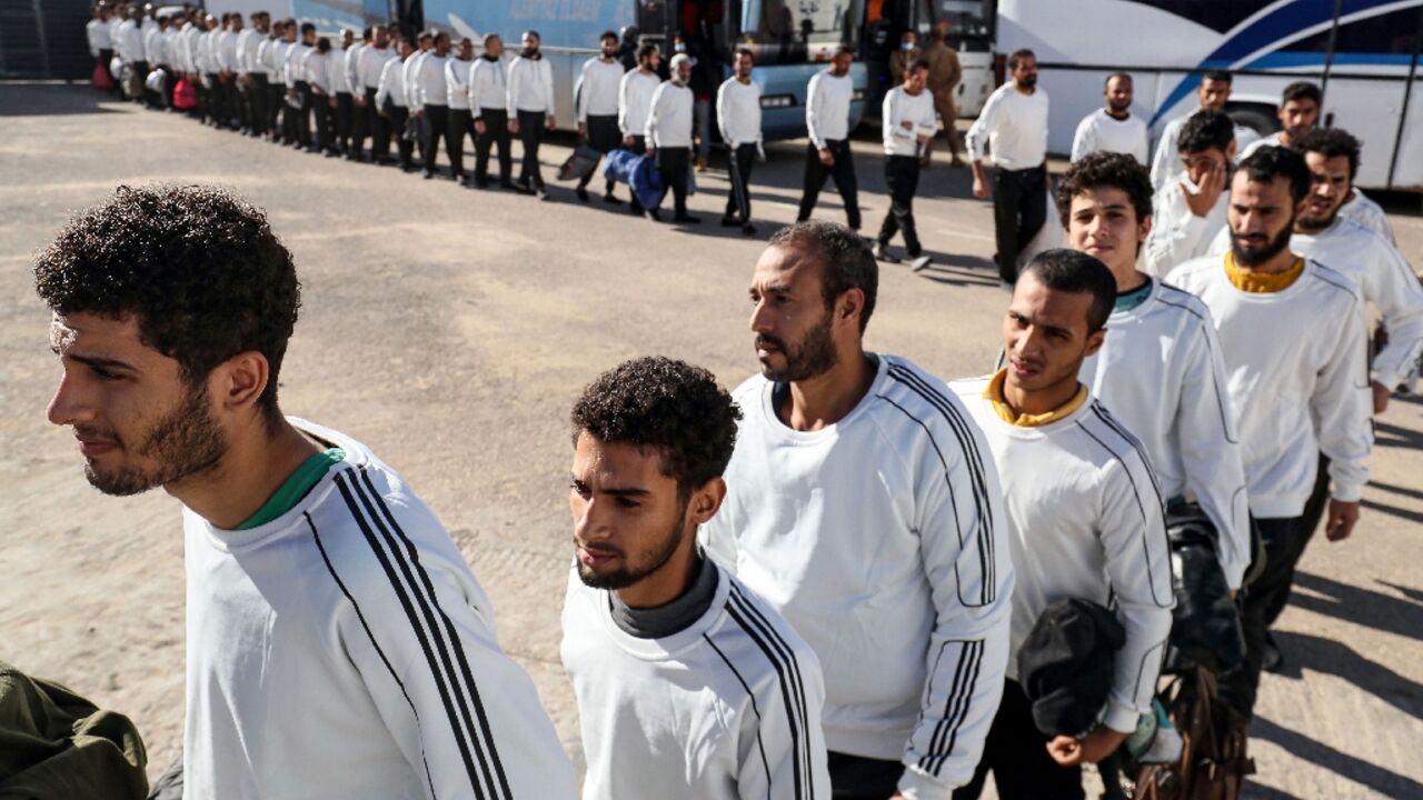 Egyptian migrants awaiting deportation by the Tripoli-based government Egyptian migrants awaiting deportation by the Tripoli-based government