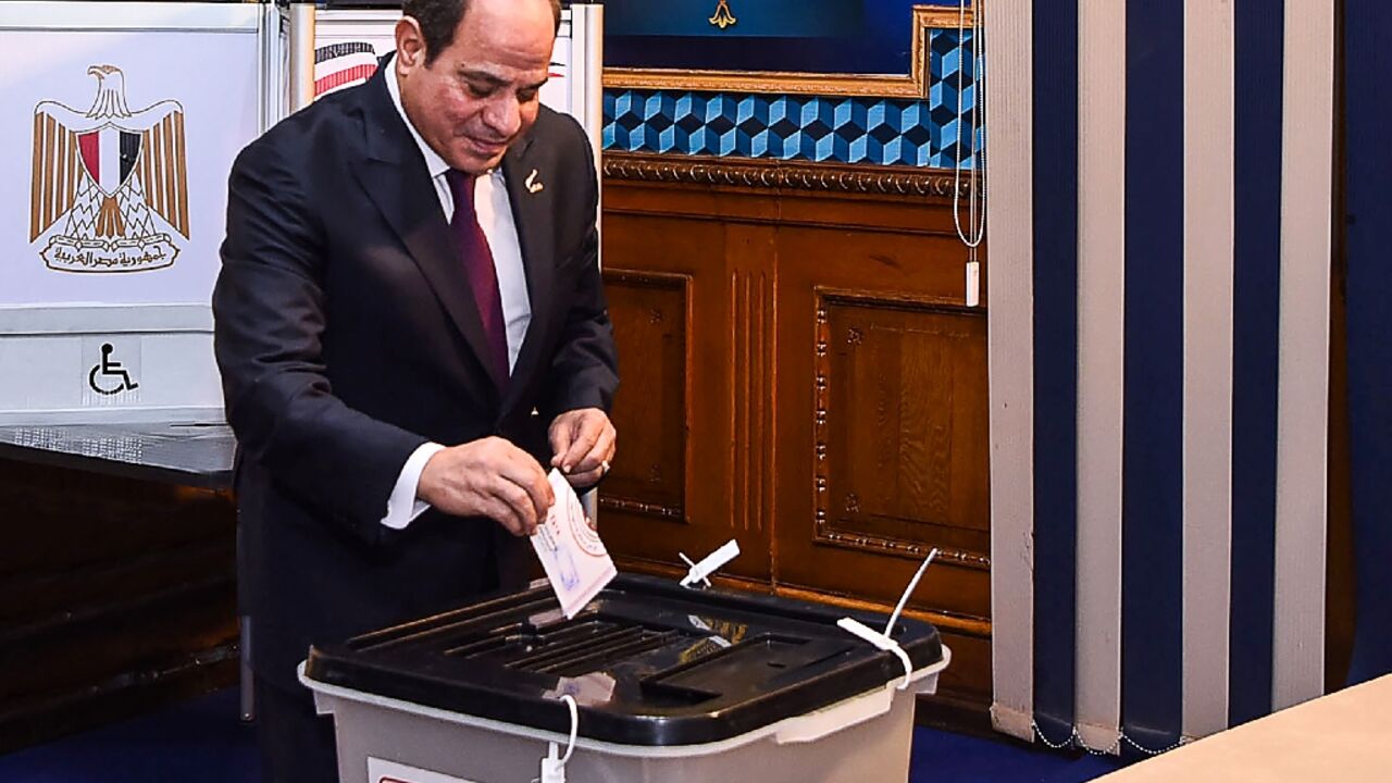 Egyptian President Abdel Fattah al-Sisi cast his vote at a school in Cairo Egyptian President Abdel Fattah al-Sisi cast his vote at a school in Cairo