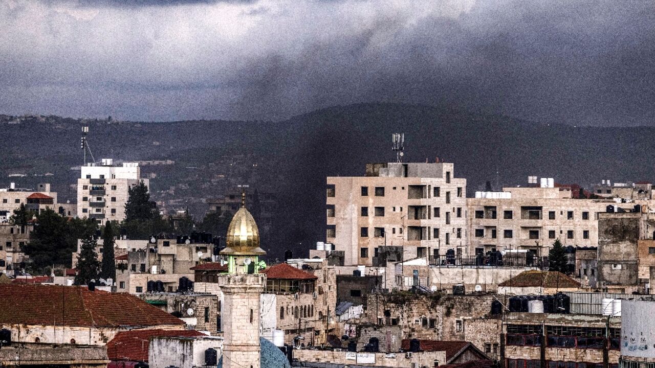 Smoke billowing from the Jenin refugee camp during the Israeli raid