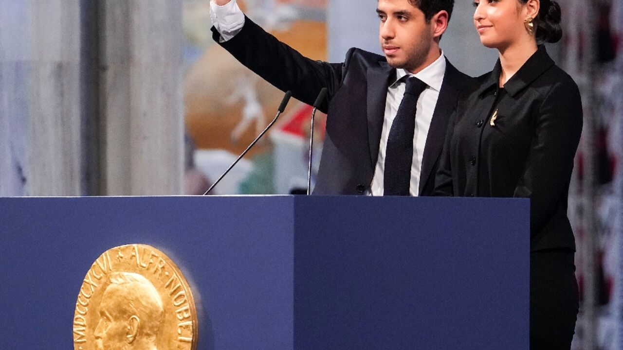 Ali and Kiana Rahmani, children of the 2023 Nobel Peace Prize laureate Narges Mohammadi, at the Oslo ceremony