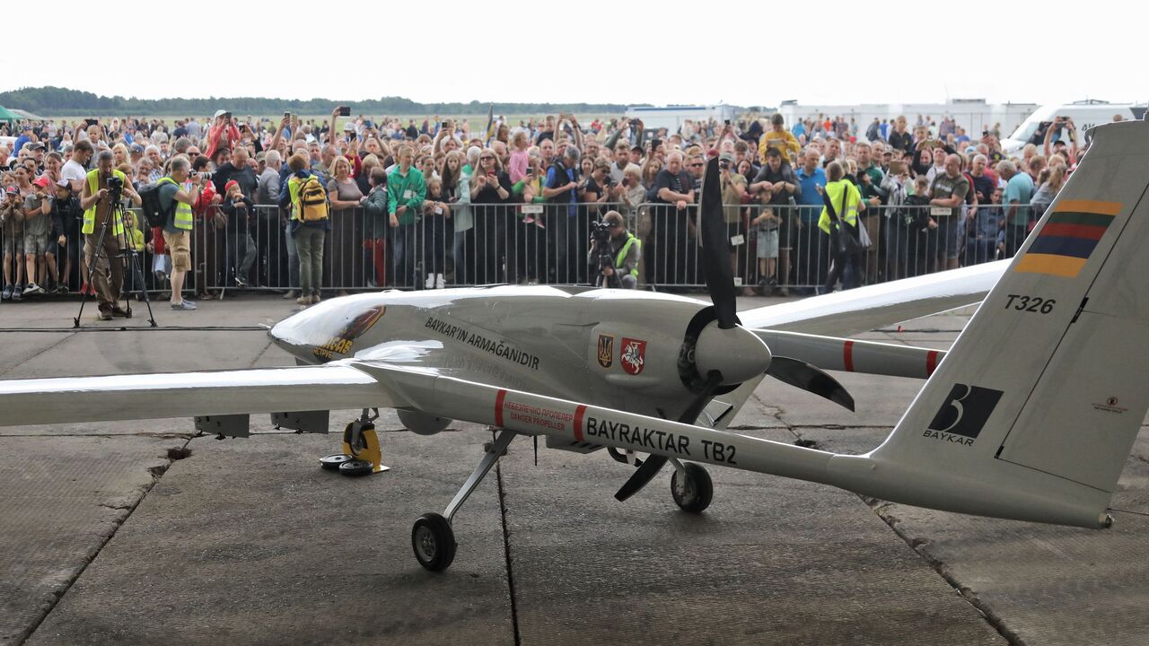 A Turkish Bayraktar TB2 combat drone is on view during a presentation at the Lithuanian Air Force Base in Siauliai, Lithuania, on July 6, 2022. 