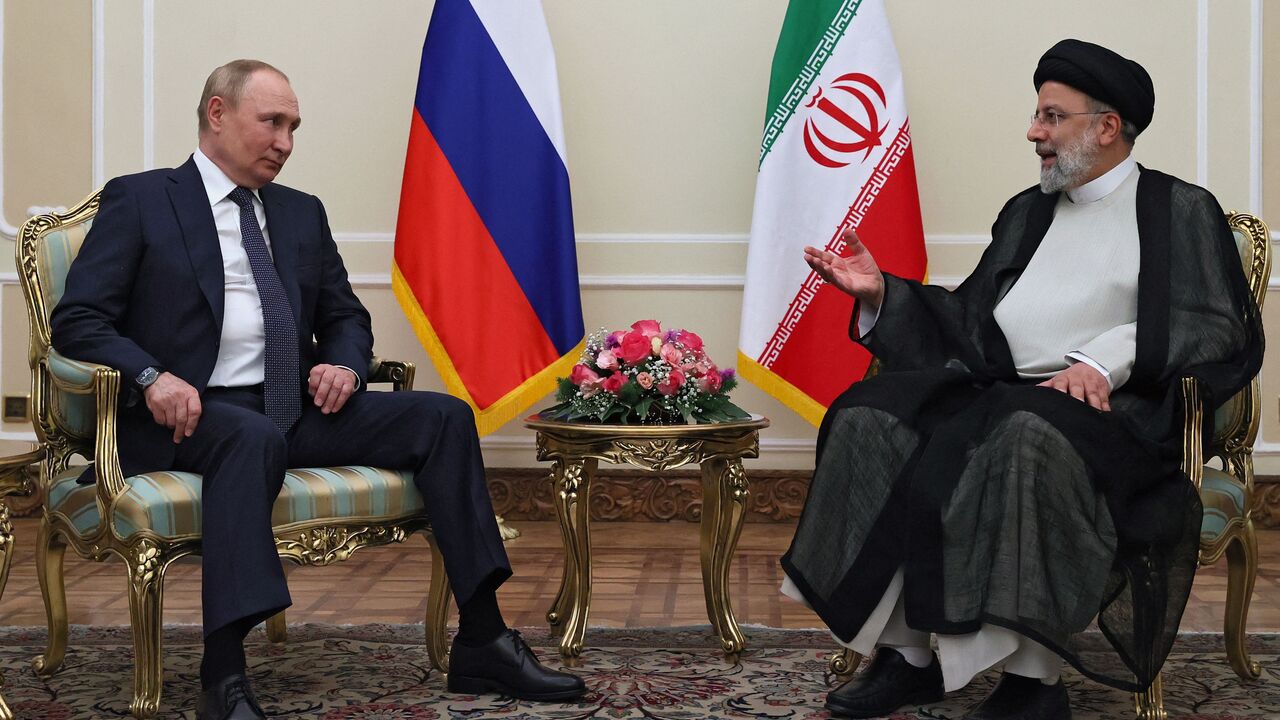 Russian President Vladimir Putin and Iran's President Ebrahim Raisi hold a meeting in Tehran on July 19, 2022. - Iran's president will host his Russian and Turkish counterparts for talks on the Syrian war in a three-way summit overshadowed by fallout from the Russian invasion of Ukraine. (Photo by Sergei SAVOSTYANOV / SPUTNIK / AFP) (Photo by SERGEI SAVOSTYANOV/SPUTNIK/AFP via Getty Images)