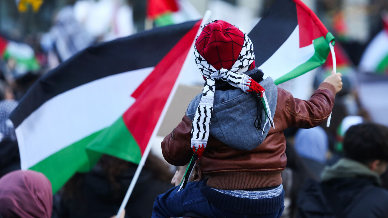 BERLIN, GERMANY - NOVEMBER 18: A child attends a demonstration in support of Palestine amidst the ongoing war in Gaza, which the Israeli government says targets Hamas, the Palestinian Sunni Islamist political and military organization governing the Gaza Strip, on November 18, 2023 in Berlin, Germany. According to Hamas' health ministry, over 11,500 people have been killed in Gaza since Israel began retaliation for the group's deadly attack on October 7, in which around 1,200 people were killed and 240 other