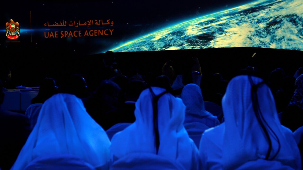 Emiratis attend the presentation of the UAE Space Agency's strategic frameworks on May 25, 2015, at the National Exhibition Center in Abu Dhabi.