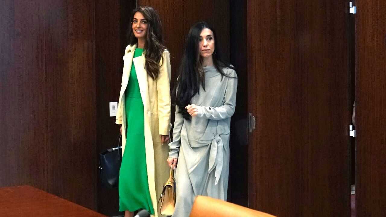 Attorney Amal Clooney (L), co-Founder is part of a legal team representing Nadia Murad (R)and some 430 Yazidi Americans in a suit against French company Lafarge Attorney Amal Clooney (L), co-Founder is part of a legal team representing Nadia Murad (R)and some 430 Yazidi Americans in a suit against French company Lafarge