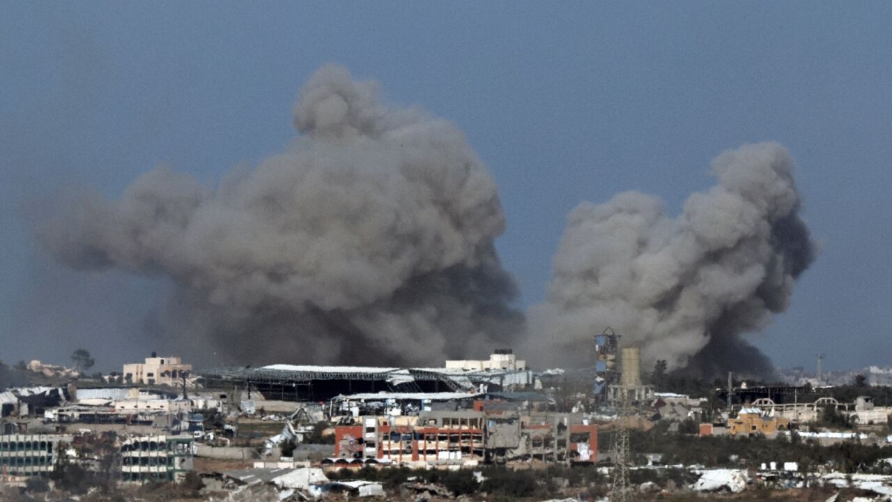 Smoke billows over the Palestinian territory of Gaza during Israeli bombardment on December 29, 2023 Smoke billows over the Palestinian territory of Gaza during Israeli bombardment on December 29, 2023