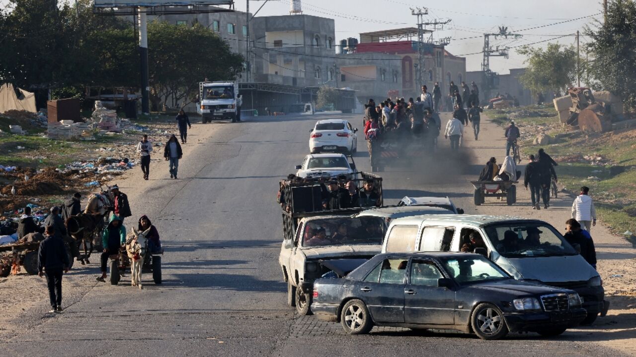 Palestinians flee Khan Yunis in southern Gaza Strip further south toward Rafah, near the Egyptian border