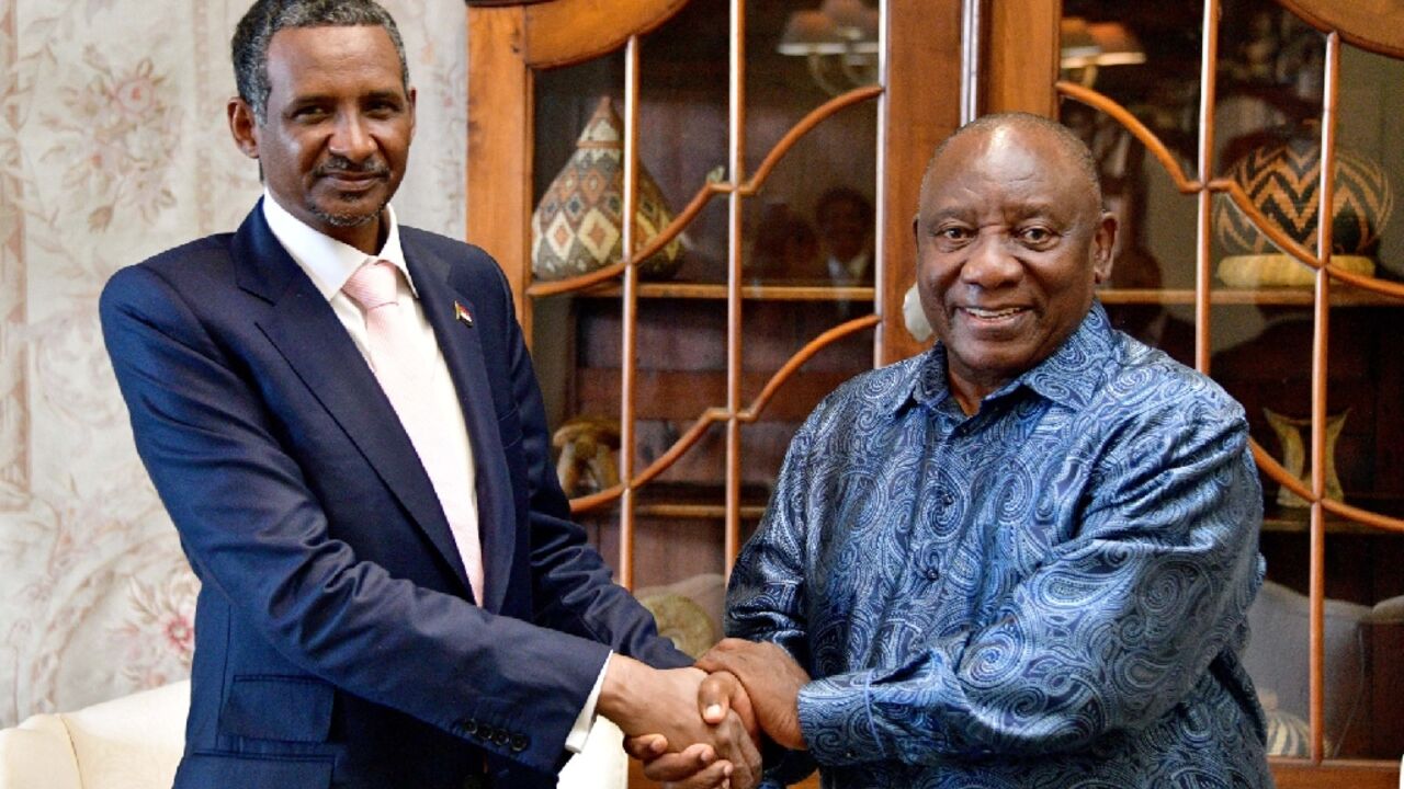 Sudan's paramilitary chief Mohamed Hamdan Daglo (L), with South African President Cyril Ramaphosa (R) in Pretoria, has been greeted as if he were a head of state, analysts say Sudan's paramilitary chief Mohamed Hamdan Daglo (L), with South African President Cyril Ramaphosa (R) in Pretoria, has been greeted as if he were a head of state, analysts say