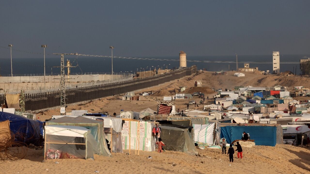 A makeshift camp housing displaced Palestinians in Rafah, near the Egyptian border in the southern Gaza Strip A makeshift camp housing displaced Palestinians in Rafah, near the Egyptian border in the southern Gaza Strip