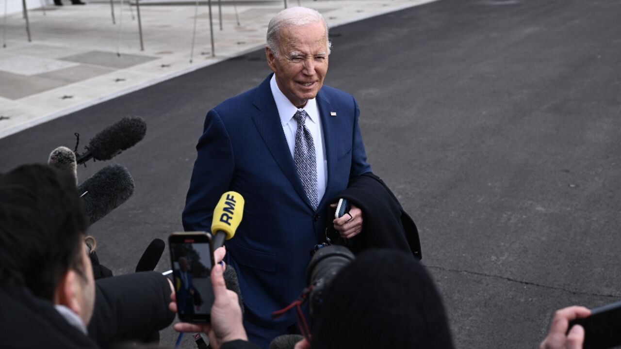 US President Joe Biden speaks to reporters before boarding Marine One on the South Lawn of the White House