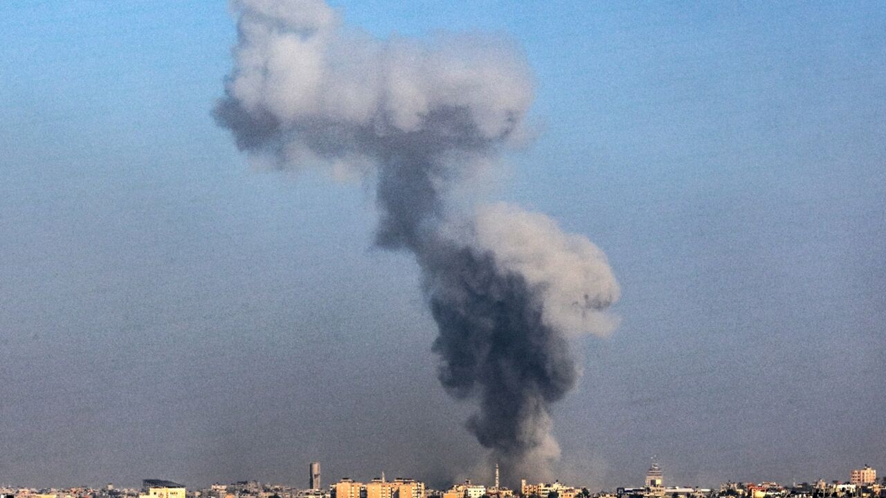 Smoke billows over Khan Yunis in the southern Gaza Strip during Israeli bombardment