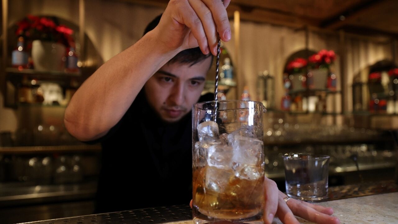 A bartender prepares a non-alcoholic cocktail in Riyadh A bartender prepares a non-alcoholic cocktail in Riyadh