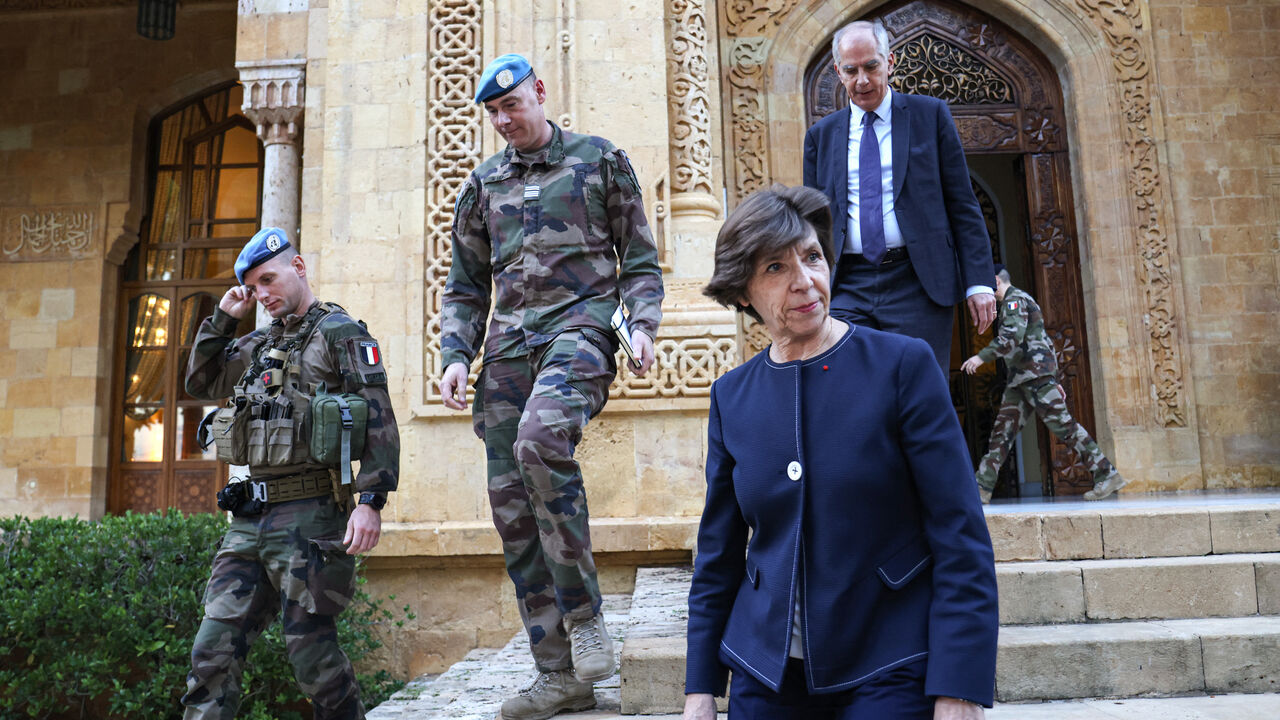 France's Minister of Foreign Affairs Catherine Colonna (2R) meets with soldiers of the French contingent of the United Nations Interim Force in Lebanon (UNIFIL), outside the Pine Residence, the French Ambassador's official residence in Beirut, on December 18, 2023. France's top diplomat is in Lebanon on December 18, for talks on de-escalating near-daily exchanges of fire on the Israel border, which have triggered fears of all-out conflict. (Photo by Anwar AMRO / AFP) (Photo by ANWAR AMRO/AFP via Getty Image